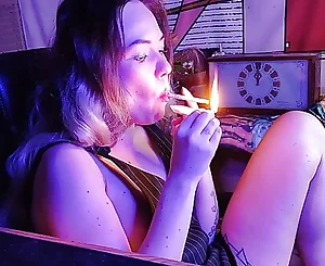 stunning stepsister smokes a ciggy