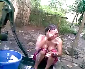 village sweetie bathing outdoor and took a self